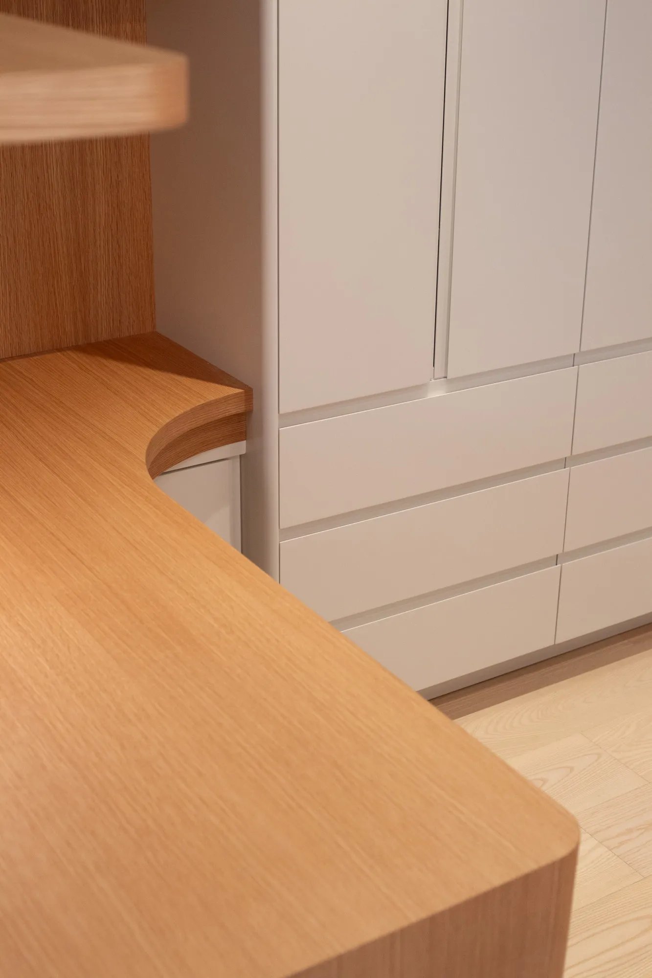 Floating corner — painted carcass meeting oak top