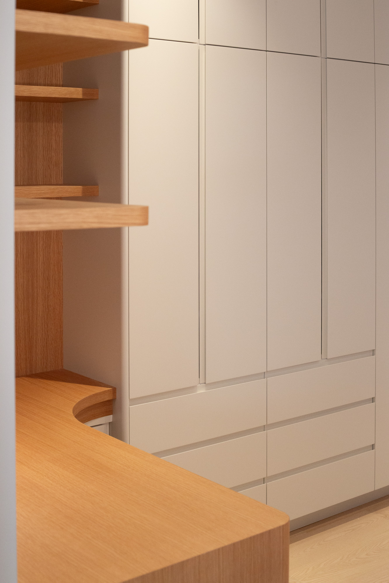 The built-in, all doors closed — a calm painted wall